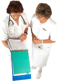 Nurses examining patient's chart