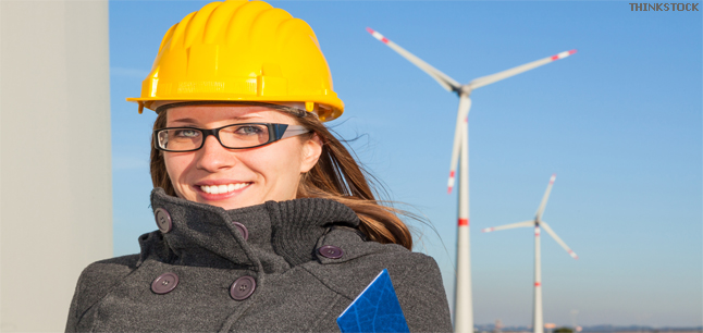 Female engineer in a wind turbine farm